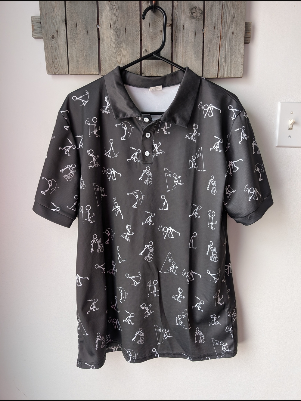Black Polo Shirt with White Golf Stick-Figure Print